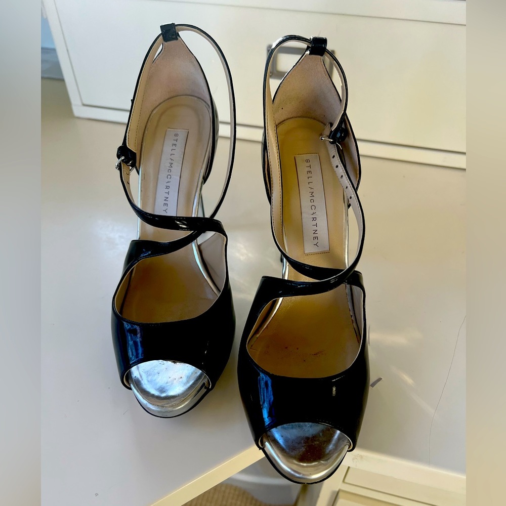 Patent black high hill sandals , wore once.